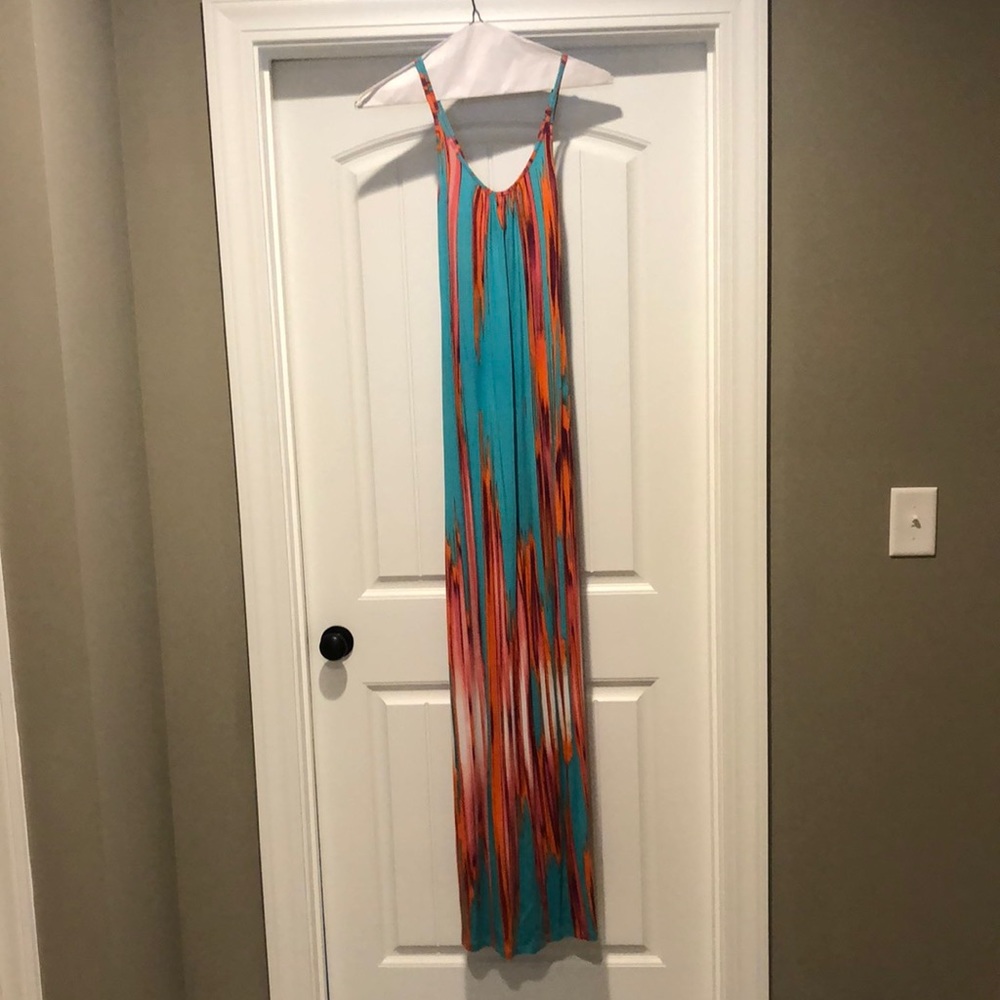 Long maxi tart dress.  Back is low.  Worn maybe 2 or 3 times. Like brand new